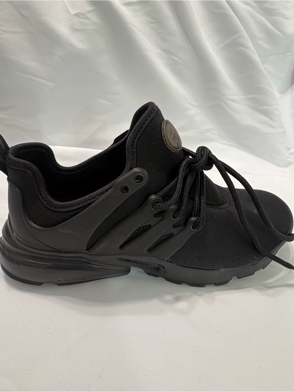 Nike Women's Black Slip-On Athletic Sneaker with Lace Detail